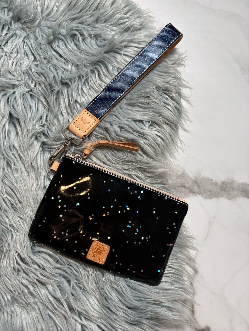 Consuela Dreamy glossy patent wristlet pouch in black stars